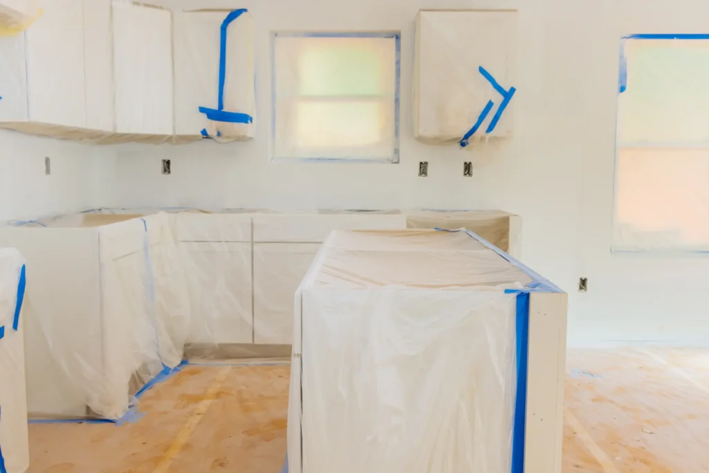 Kitchen island and cabinets prepped for painting in Chico, CA